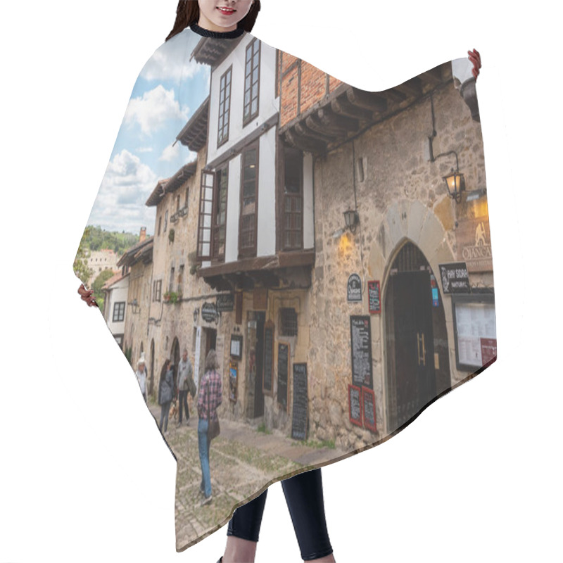 Personality  Santillana Del Mar, Spain - Mai 18, 2024 - Tourists On A Cobblestone Street Surrounded By Ancient Houses And A Stone Wall In The Medieval Little Town Santillana Del Mar, Cantabria Region In Northern Spain Hair Cutting Cape