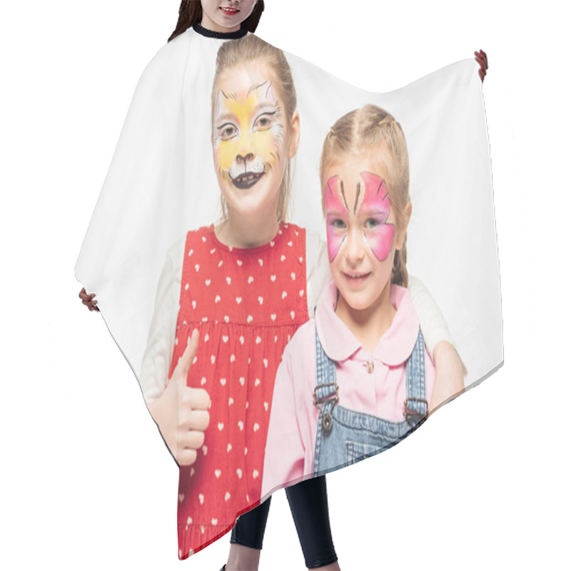 Personality  Adorable Kid With Cat Muzzle Painting On Face Showing Thumb Up While Embracing Friend With Painted Butterfly Mask Isolated On White Hair Cutting Cape