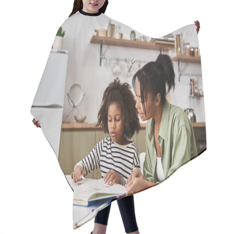 Personality  A Devoted Mother Reads With Her Young Daughter In Their Cozy Kitchen Filled With Warmth And Love. Hair Cutting Cape