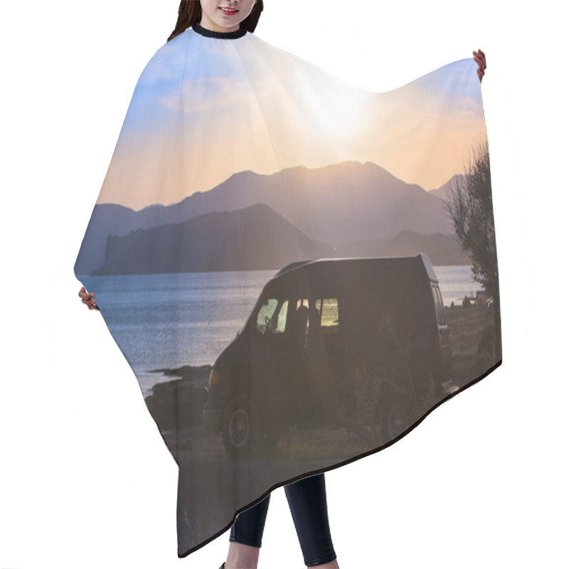 Personality  Minivan By The Seashore At Sunset Against The Backdrop Of Mountains Hair Cutting Cape