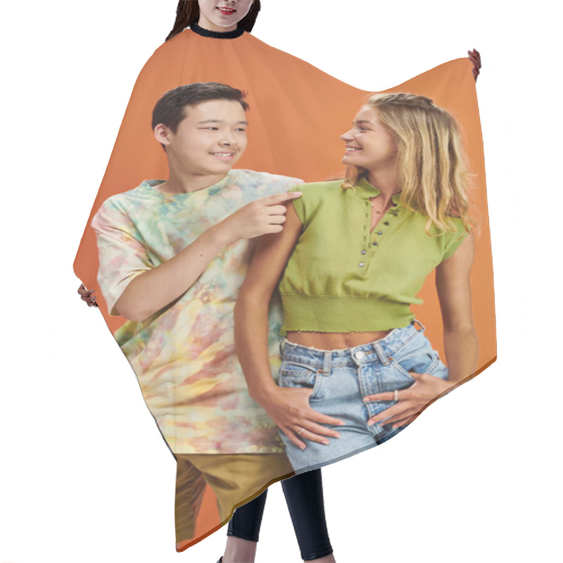 Personality  Joyous Interracial Teenagers In Casual Attires Smiling At Each Other On Orange Backdrop, Friendship Hair Cutting Cape