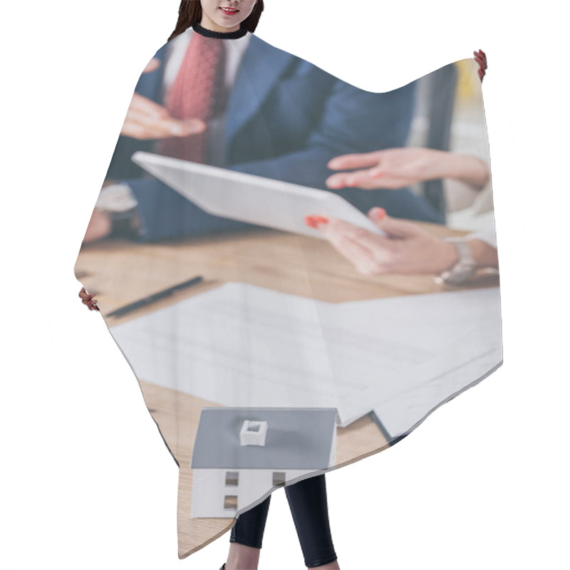 Personality  Selective Focus Of House Model Near Woman Holding Digital Tablet And Businessman Pointing With Hand Hair Cutting Cape