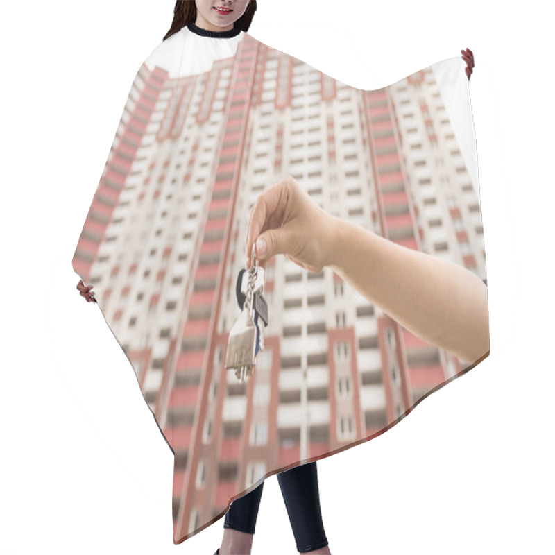 Personality  Closeup Image Of Young Woman Showing Keys From New Apartment. Concept Of Real Estate Investment Hair Cutting Cape