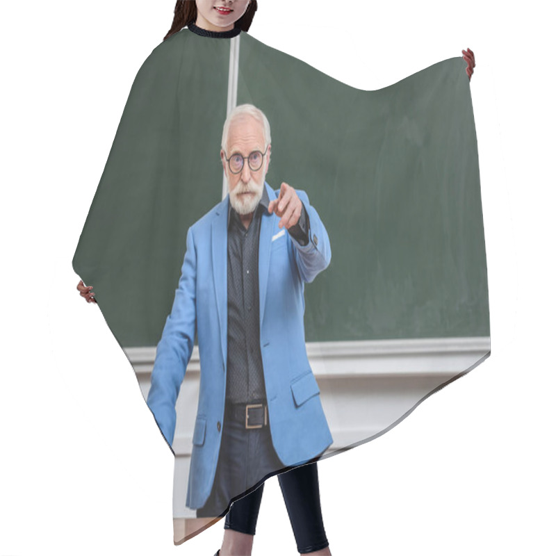 Personality  Senior Lecturer Pointing On Something In Lecture Room Hair Cutting Cape