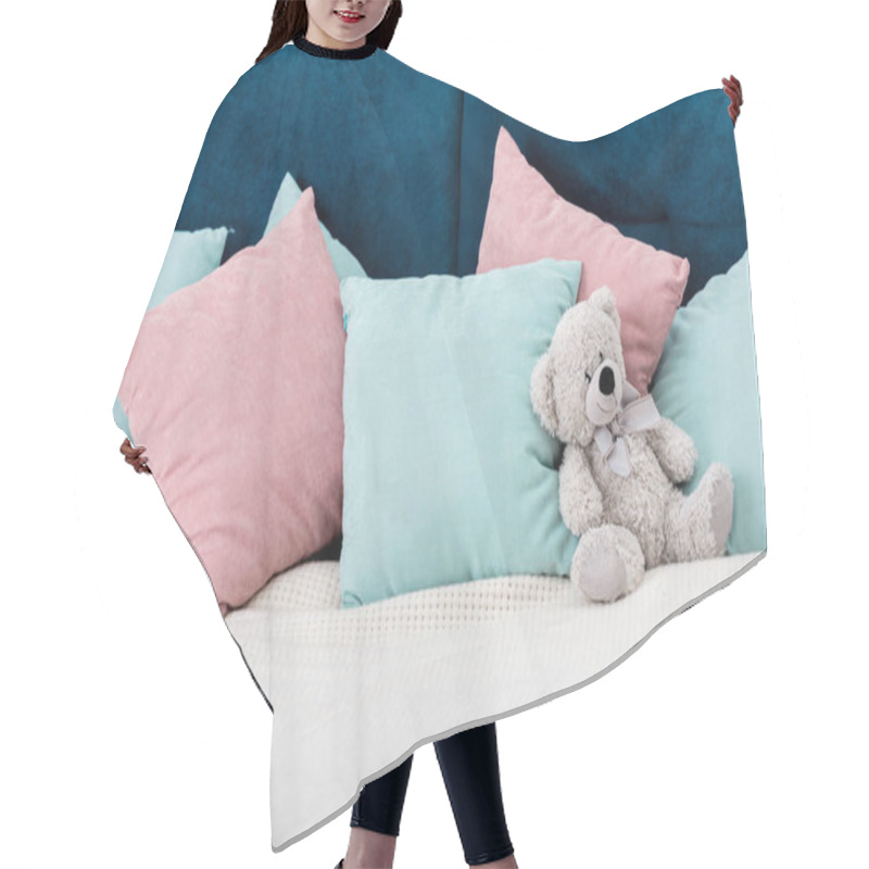 Personality  Teddy Bear Laying On The Bed With Pillows On Background Hair Cutting Cape