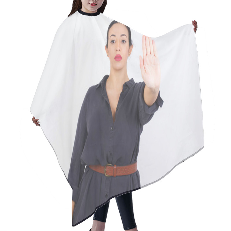 Personality  Arab Woman Wearing Dress Against White Studio Background Doing Stop Gesture With Palm Of The Hand. Warning Expression With Negative And Serious Gesture On The Face. Hair Cutting Cape