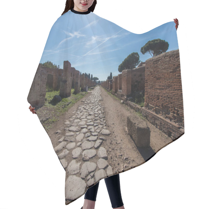 Personality  Ancient Roman Road Paved With Stones For Carriage. Decumano Maximum In Ostia Ancient 2nd Century. Sun, Sea Pines And Roman Ruins In The Background Hair Cutting Cape