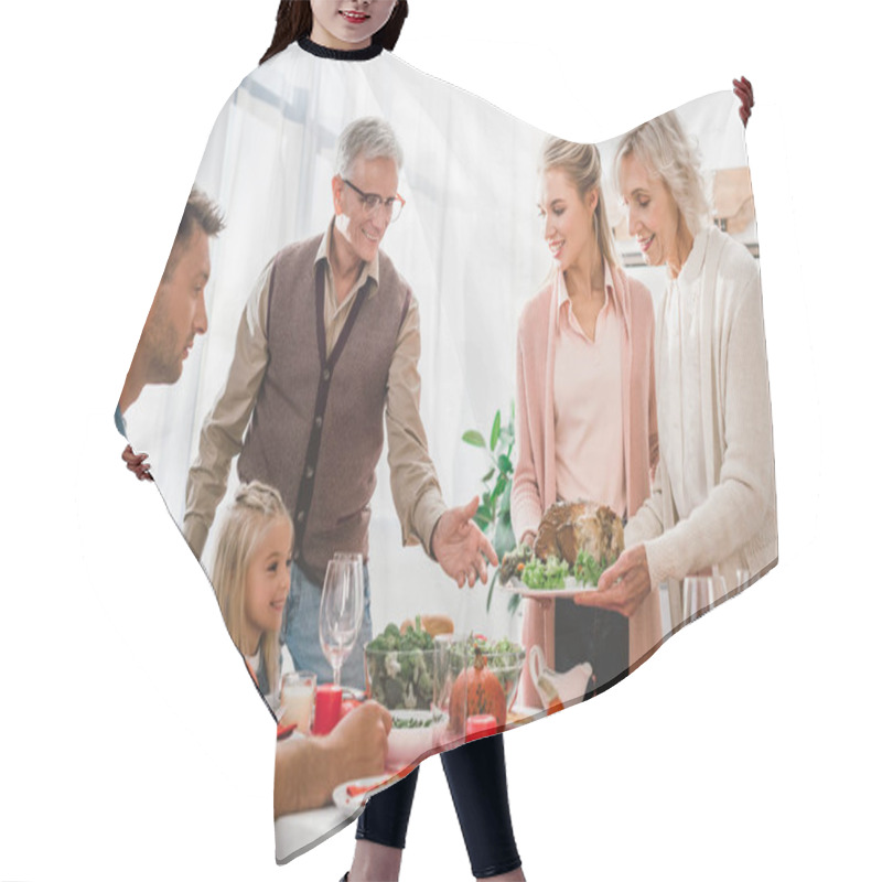 Personality   Family Members Sitting At Table And Holding Plate With Turkey In Thanksgiving Day       Hair Cutting Cape