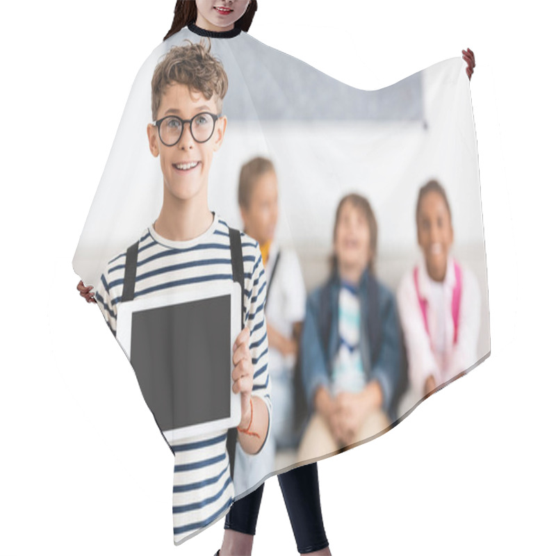 Personality  Selective Focus Of Schoolboy In Eyeglasses Showing Digital Tablet With Blank Screen In Classroom  Hair Cutting Cape