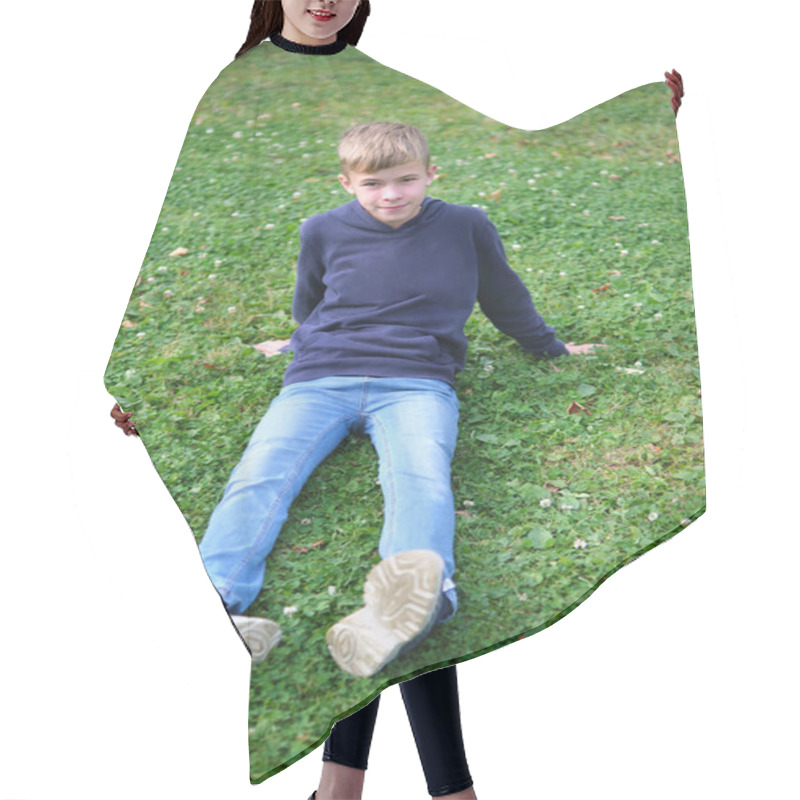 Personality  Portrait Of Child Boy Outdoors Resting On Grass Lawn Hair Cutting Cape