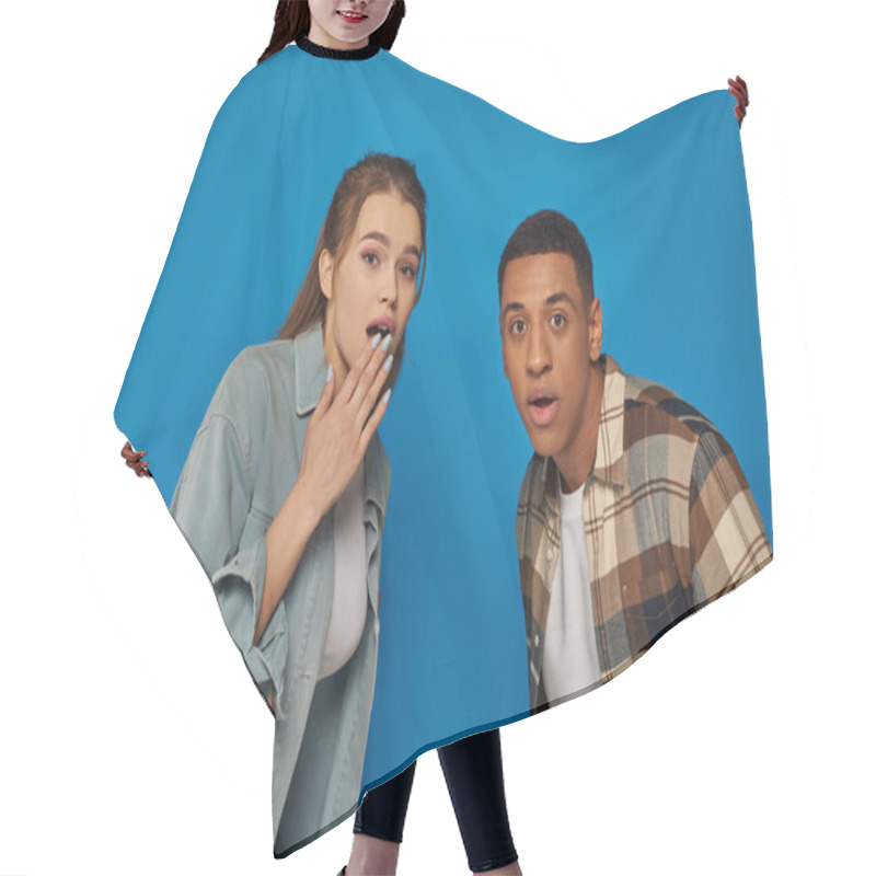 Personality  Shocked Multicultural Man And Woman With Open Mouth Looking At Camera On Blue Background, Diversity Hair Cutting Cape