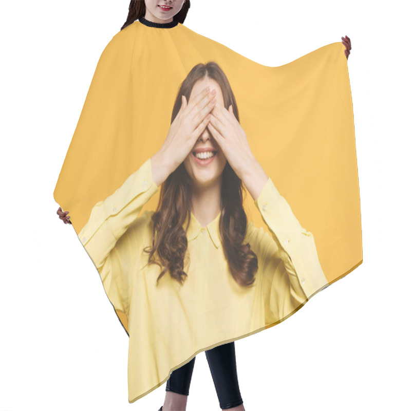 Personality  Cheerful Girl Covering Eyes With Hand On Yellow Background Hair Cutting Cape