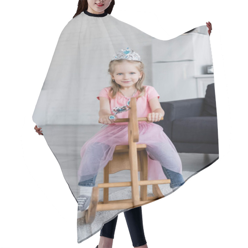 Personality  Smiling Girl In Toy Crown Riding Rocking Horse While Looking At Camera Hair Cutting Cape