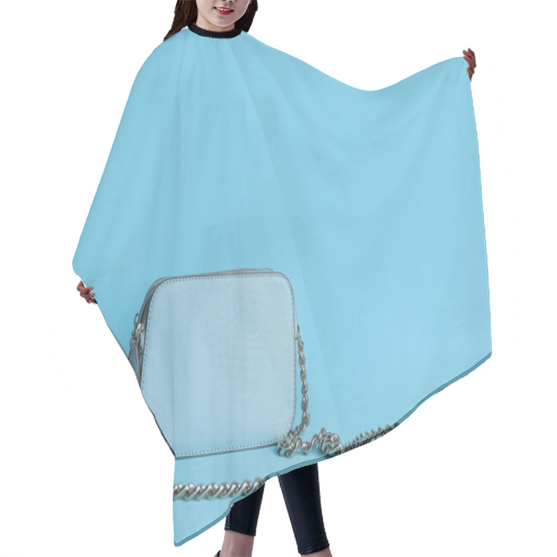 Personality  Stylish Woman's Bag On Light Blue Background Hair Cutting Cape