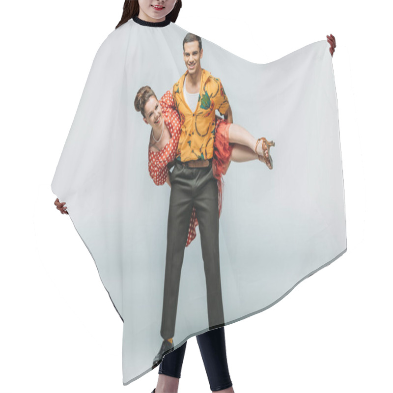 Personality  Cheerful Man Holding Woman While Dancing Boogie-woogie On Grey Background Hair Cutting Cape