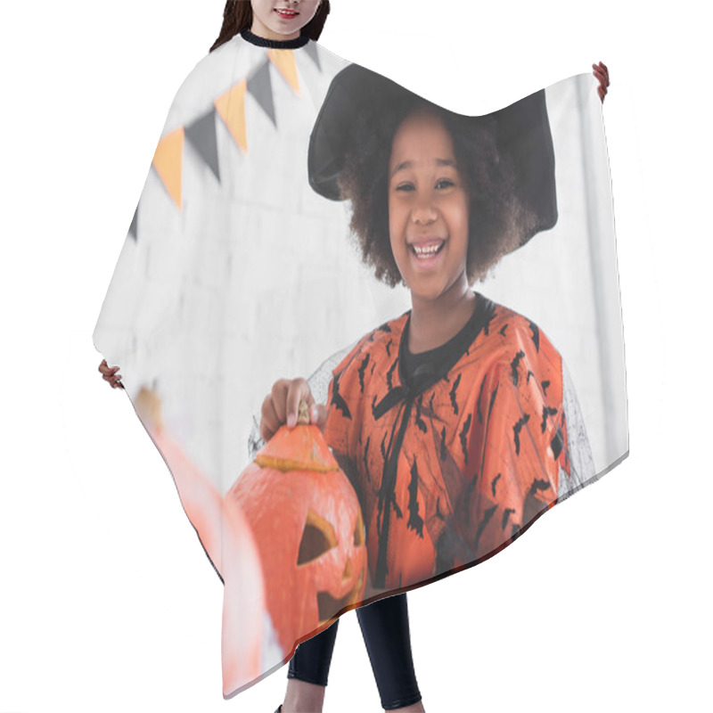 Personality  Happy African American Girl In Witch Halloween Costume Near Caved Pumpkins   Hair Cutting Cape