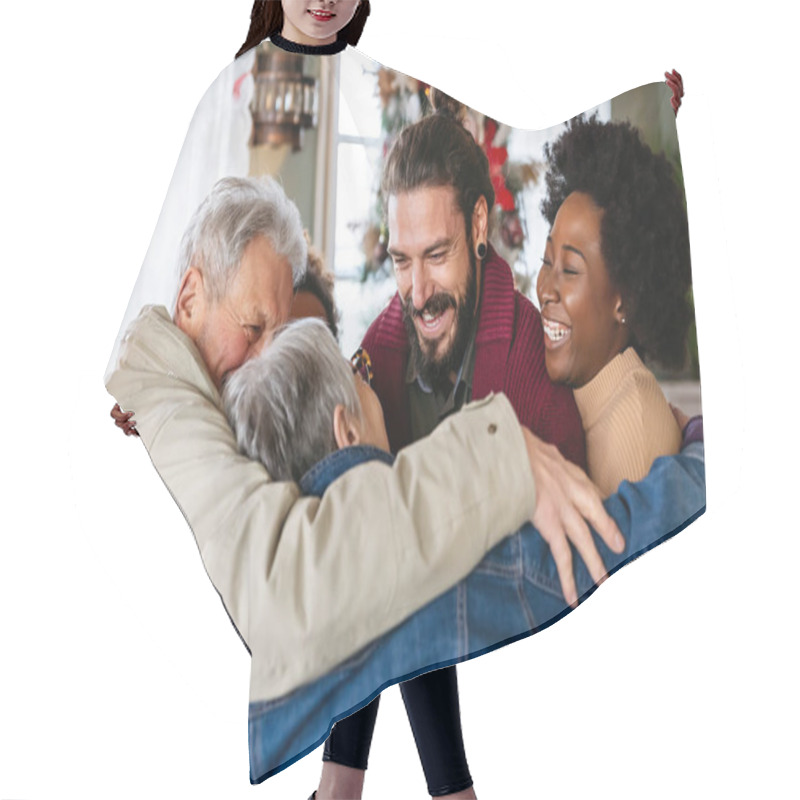 Personality  Happy Multiethnic Multigenerational Family Enjoying Christmas Time Together. People Love Concept. Hair Cutting Cape