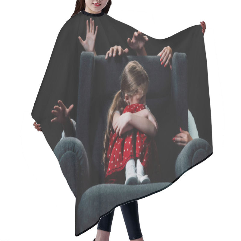 Personality  Scared Child Sitting In Armchair Surrounded With Human Hands Isolated On Black Hair Cutting Cape