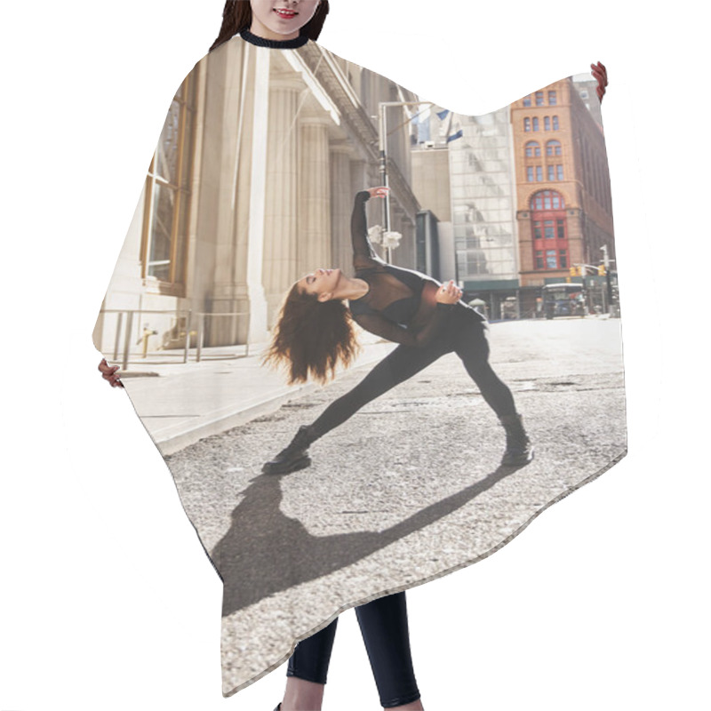 Personality  A Young Woman Dances On A New York City Street. Hair Cutting Cape