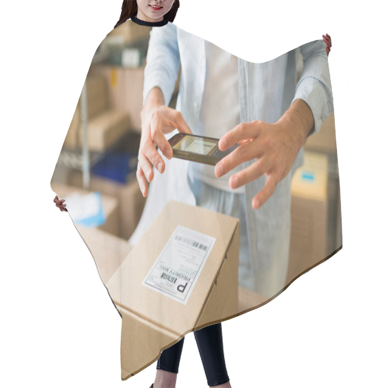 Personality  Closeup Of A Business Owner Using Mobile Phone To Scan Barcode On Cardboard Box, Managing Orders And Inventory In His Small Company Storehouse Hair Cutting Cape