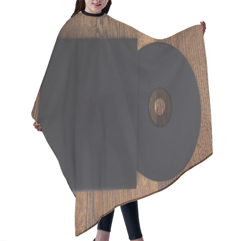 Personality  Topview Of Blank Black Compact Disk With Cover On Wooden Table. Mock Up, 3D Rendering Hair Cutting Cape