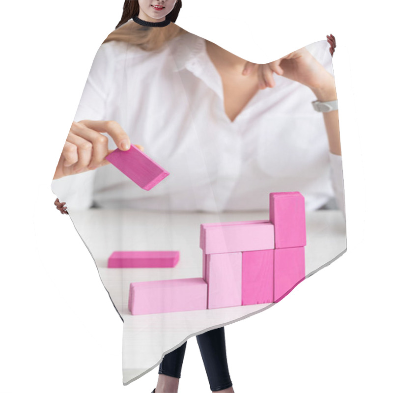 Personality  Selective Focus Of Businesswoman Stacking Marketing Pyramid With Pink Building Blocks Isolated On Grey Hair Cutting Cape