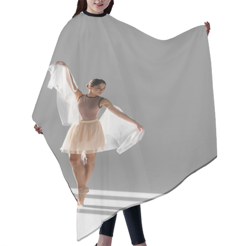 Personality  Pretty Ballerina In Beige Skirt Dancing With Cloth On Grey Background With Sunlight Hair Cutting Cape