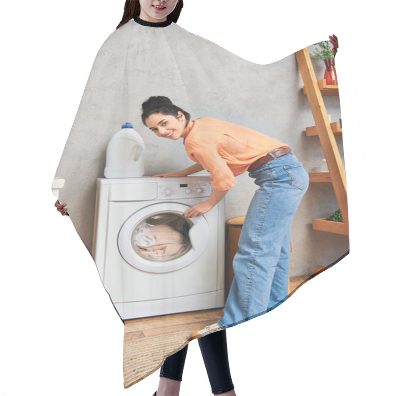 Personality  A Stylish Woman In Casual Attire Stands Next To A Washing Machine, Focused On Cleaning Her Clothes At Home. Hair Cutting Cape