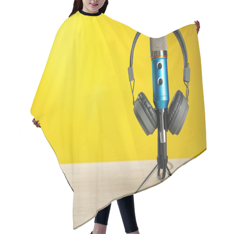 Personality  Microphone And Modern Headphones On White Wooden Table Against Yellow Background, Space For Text Hair Cutting Cape