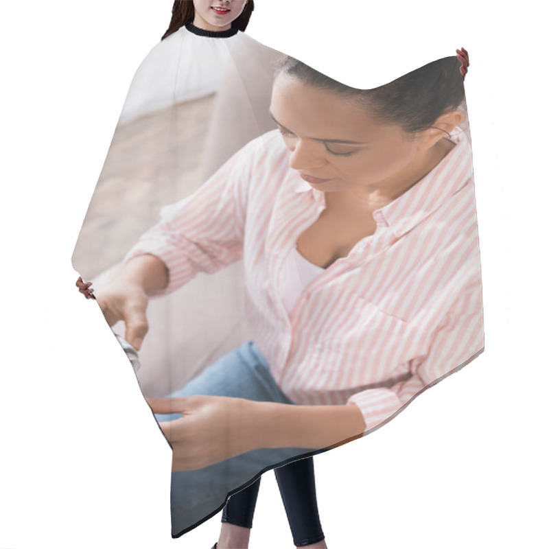 Personality  High Angle View Of Brunette African American Woman Holding Bottle With With Dried Medical Cannabis Near Glass Bong  Hair Cutting Cape