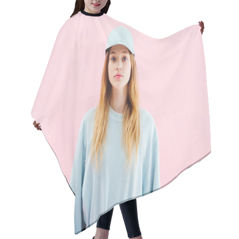 Personality  Sad Pretty Teenage Girl In Cap Looking At Camera Isolated On Pink Hair Cutting Cape