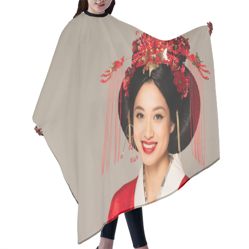 Personality  Smiling Asian Woman With Decor In Hairdo Looking At Camera Isolated On Grey  Hair Cutting Cape