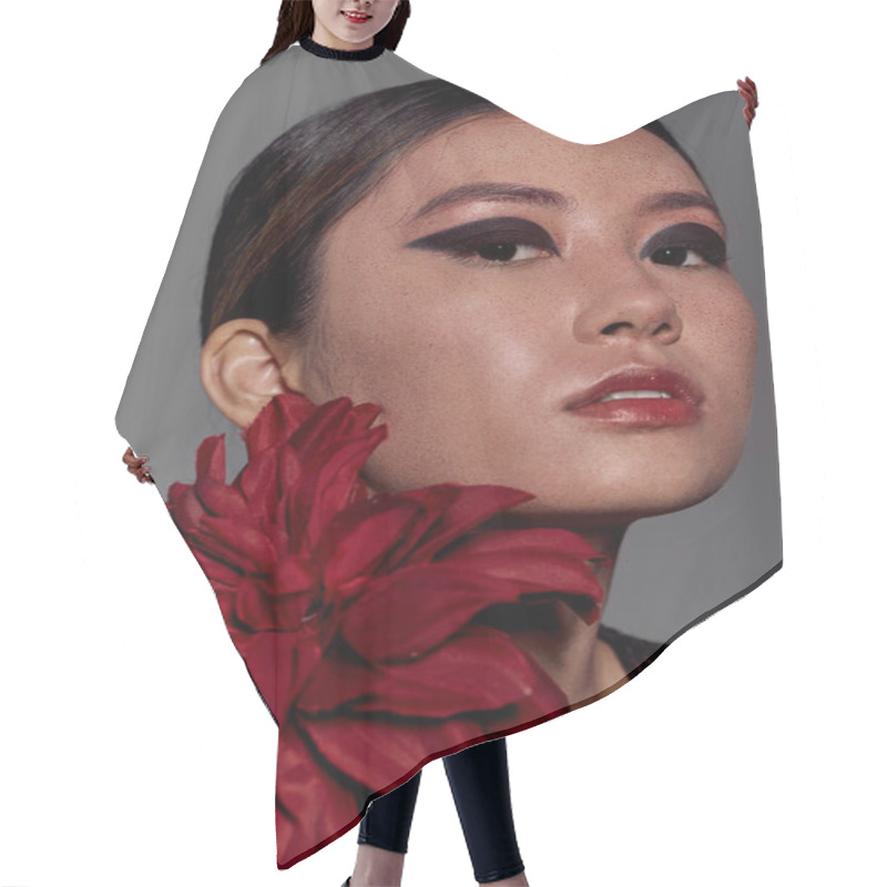 Personality  Stylish Asian Woman With Red Flower, Gazing Off-camera. Hair Cutting Cape