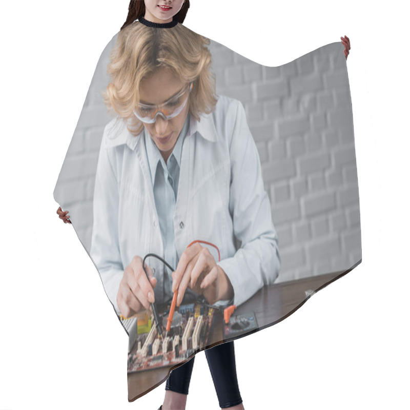 Personality  Concentrated Female Computer Engineer With Tester Examining Motherboard Hair Cutting Cape