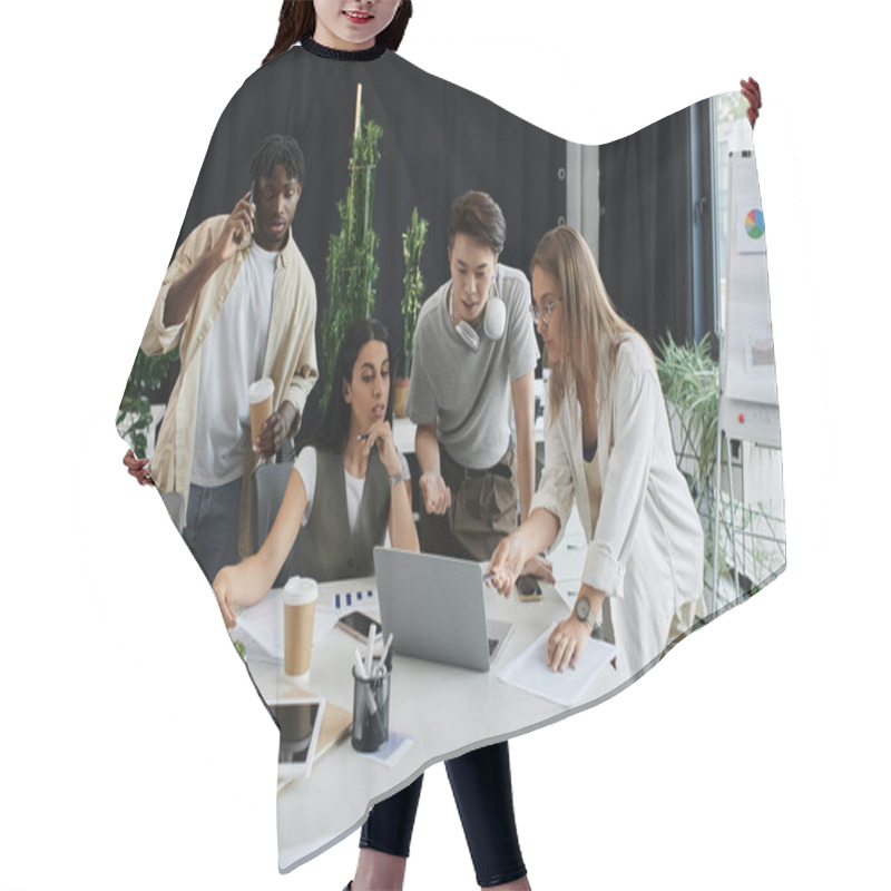 Personality  A Team Of Four Individuals Works Together On A Laptop In A Modern Office. Hair Cutting Cape