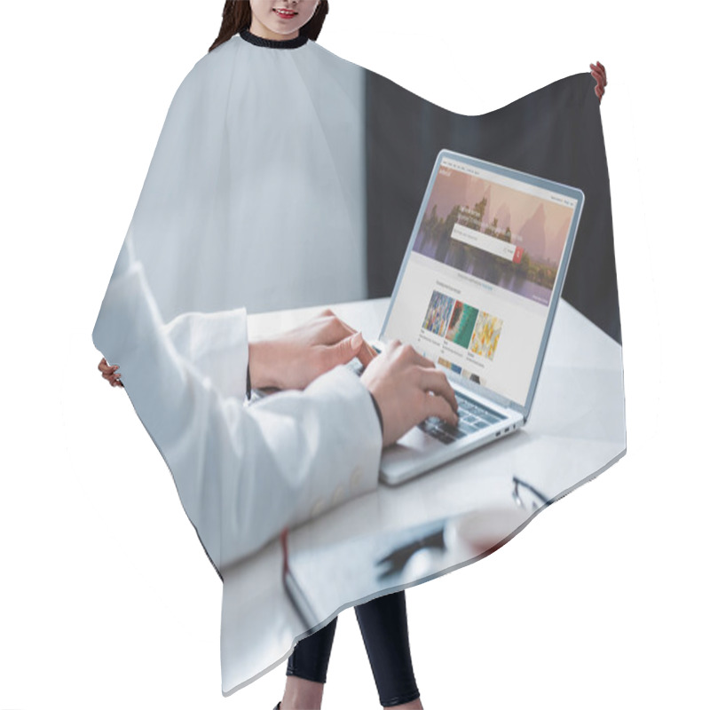 Personality  Cropped View Of Woman Using Laptop With Shutterstock Website On Screen At Office Desk Hair Cutting Cape