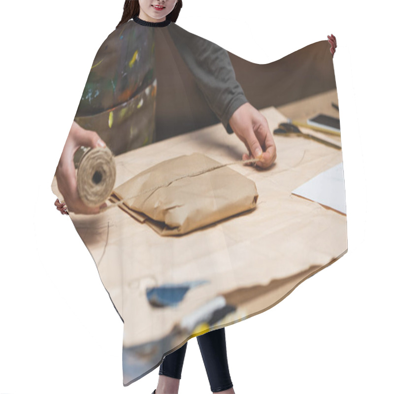 Personality  Cropped View Of African American Craftswoman Holding Twine Near Package In Workshop  Hair Cutting Cape