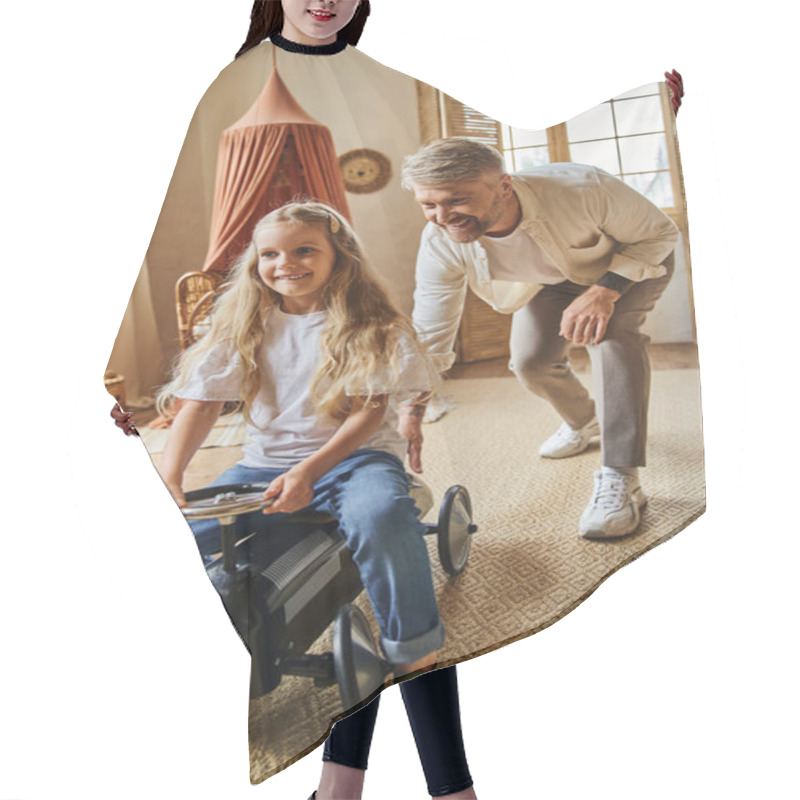 Personality  Happy Man Assisting Cheerful Daughter Riding Toy Car In Modern Living Room At Home, Playing Together Hair Cutting Cape