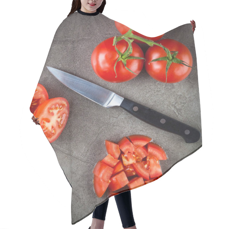 Personality  Truss Tomatoes And Kitchen Knife Arranged On Textured Stone Surface. Top View. Hair Cutting Cape