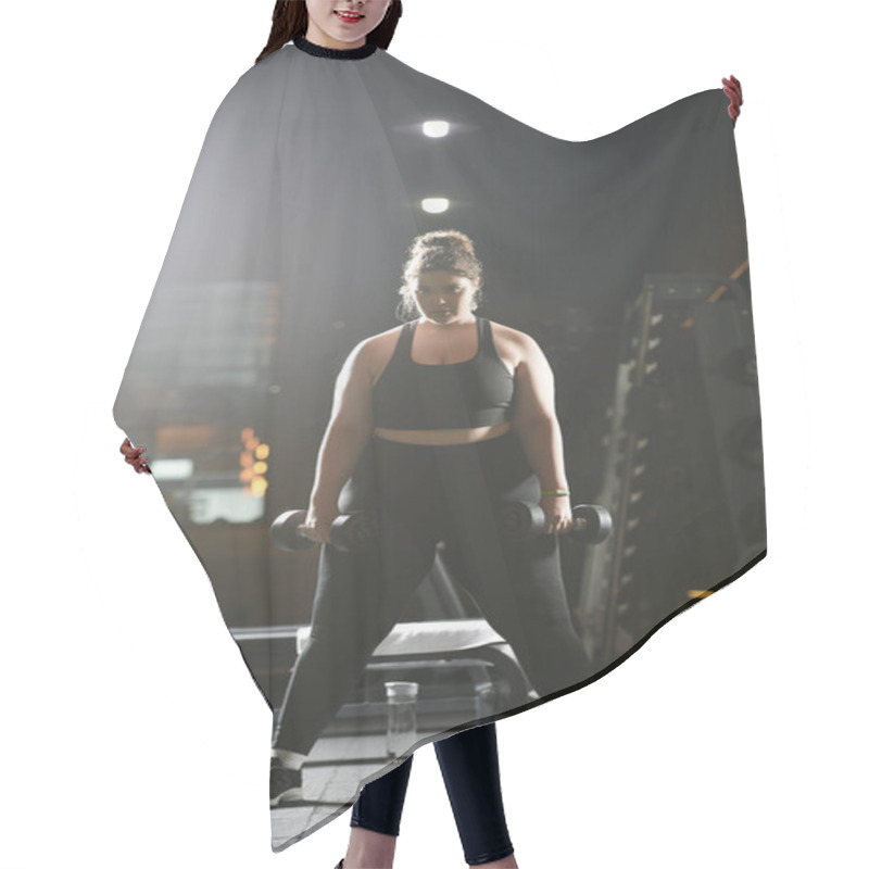 Personality  A Determined Young Woman Embraces Her Strength While Working Out In Stylish Active Wear At The Gym. Hair Cutting Cape