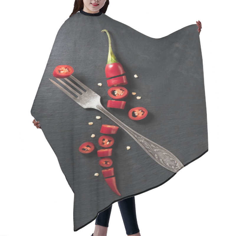 Personality  Elevated View Of Cut Red Ripe Chili Pepper And Fork On Black Surface Hair Cutting Cape