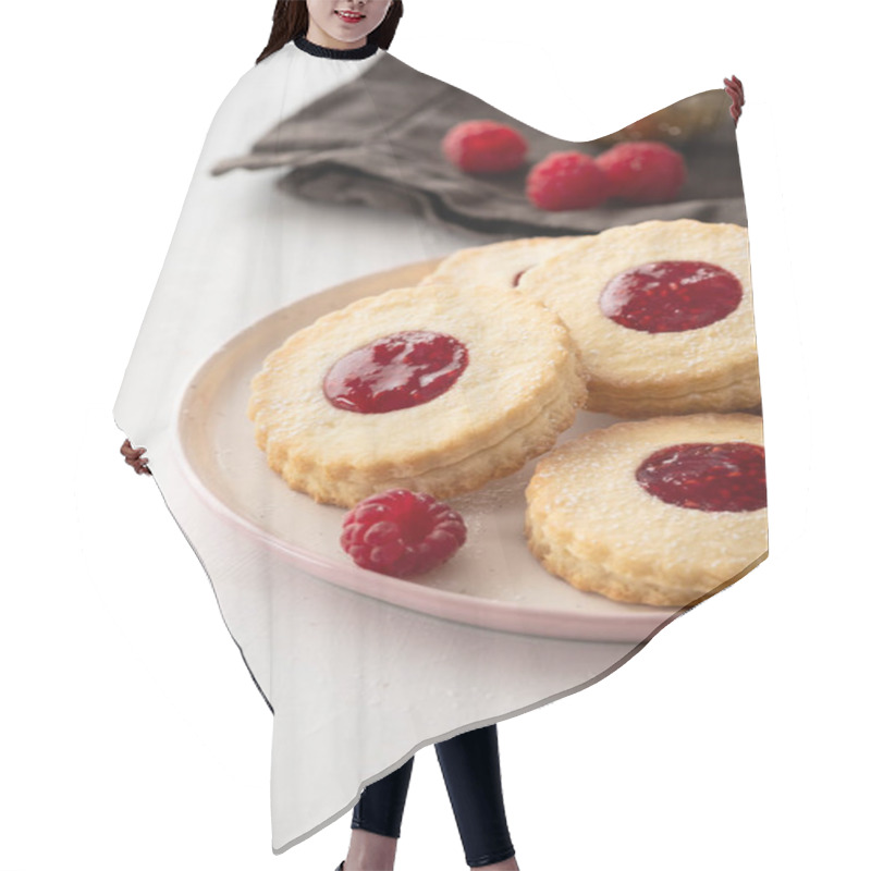 Personality  Traditional Christmas Linzer Cookies With Sweet Jam On Plate, Closeup, Copy Space. Hair Cutting Cape