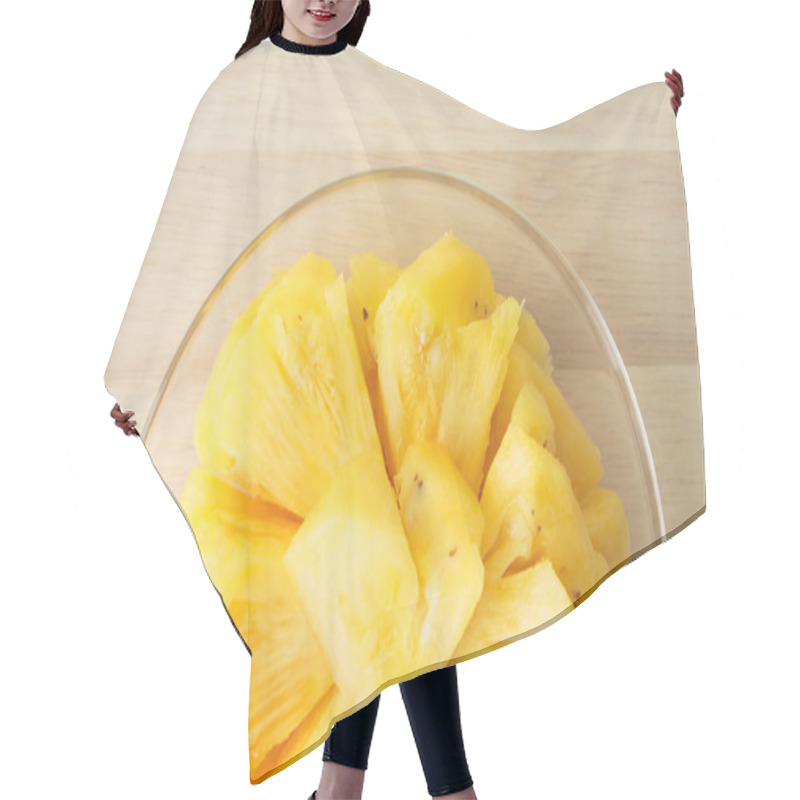 Personality  Pineapple Slice On A Plate Placed On A Wooden Table. Hair Cutting Cape