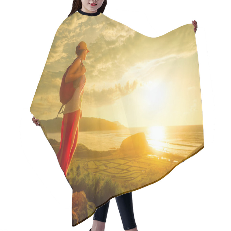 Personality  Woman Hiker Standing On The Top And Enjoying Sunset Over Sea. Hair Cutting Cape