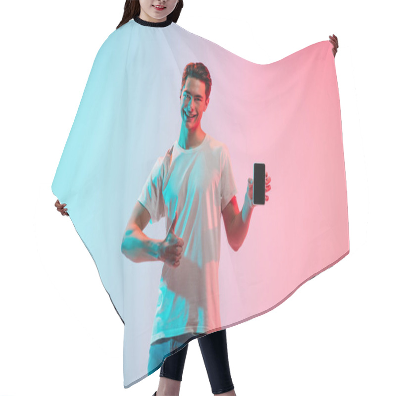 Personality  Young Caucasian Mans Portrait On Gradient Blue-pink Studio Background In Neon Light Hair Cutting Cape