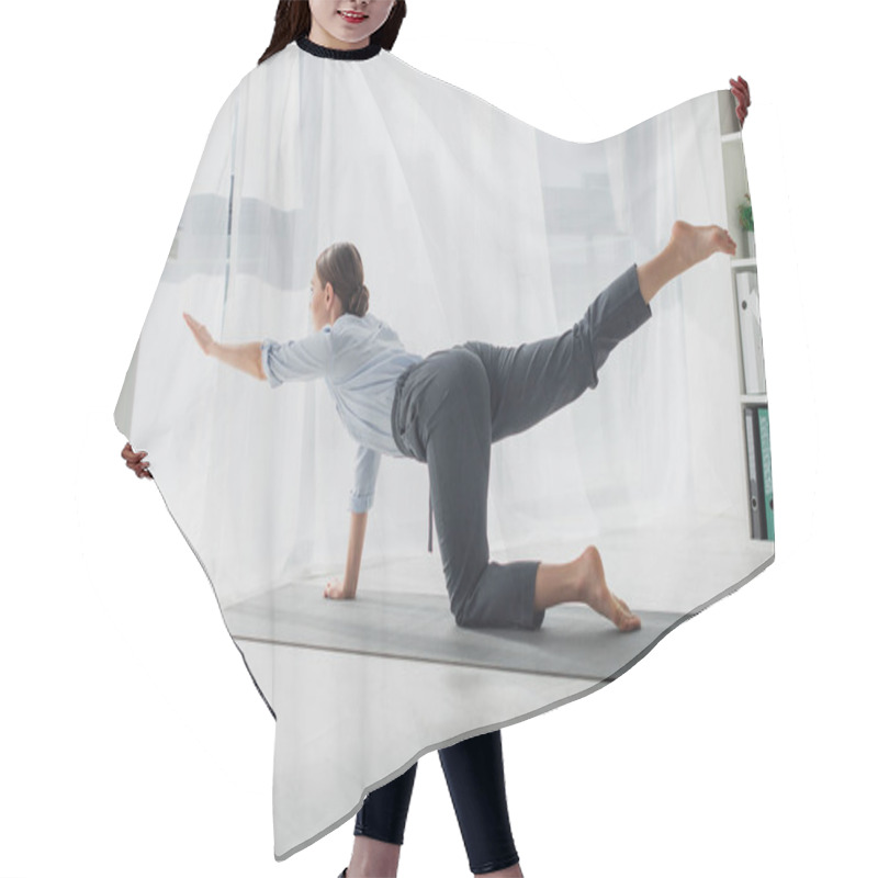 Personality  Businesswoman Practicing Yoga In Bird Dog Pose On Mat In Office  Hair Cutting Cape