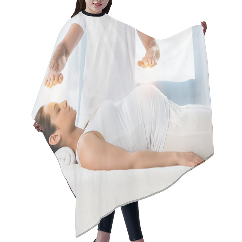 Personality  Cropped View Of Man Healing Brunette Pregnant Woman Lying On Massage Table  Hair Cutting Cape