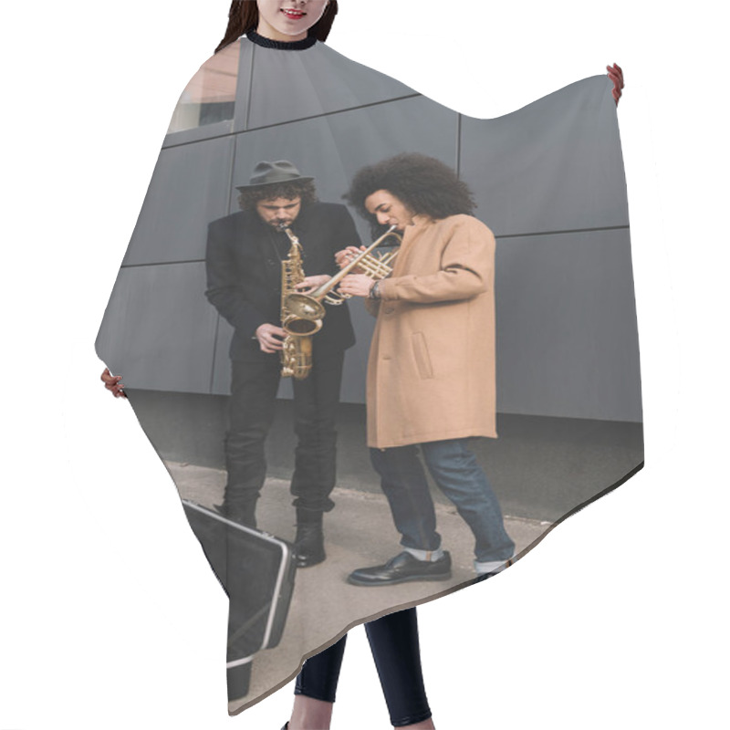 Personality  Duet Of Stylish Street Musicians Playing Trumpet And Saxophone Outdoors Hair Cutting Cape