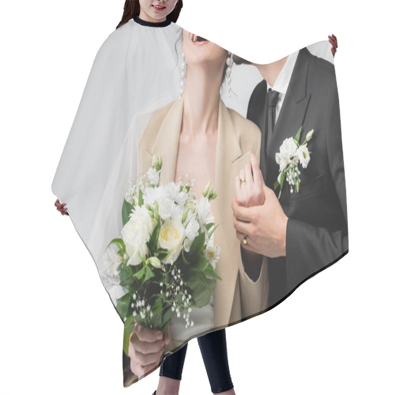 Personality  Cropped View Of Elegant Arabian Groom Kissing Bride Holding Wedding Bouquet And Laughing Isolated On Grey Hair Cutting Cape