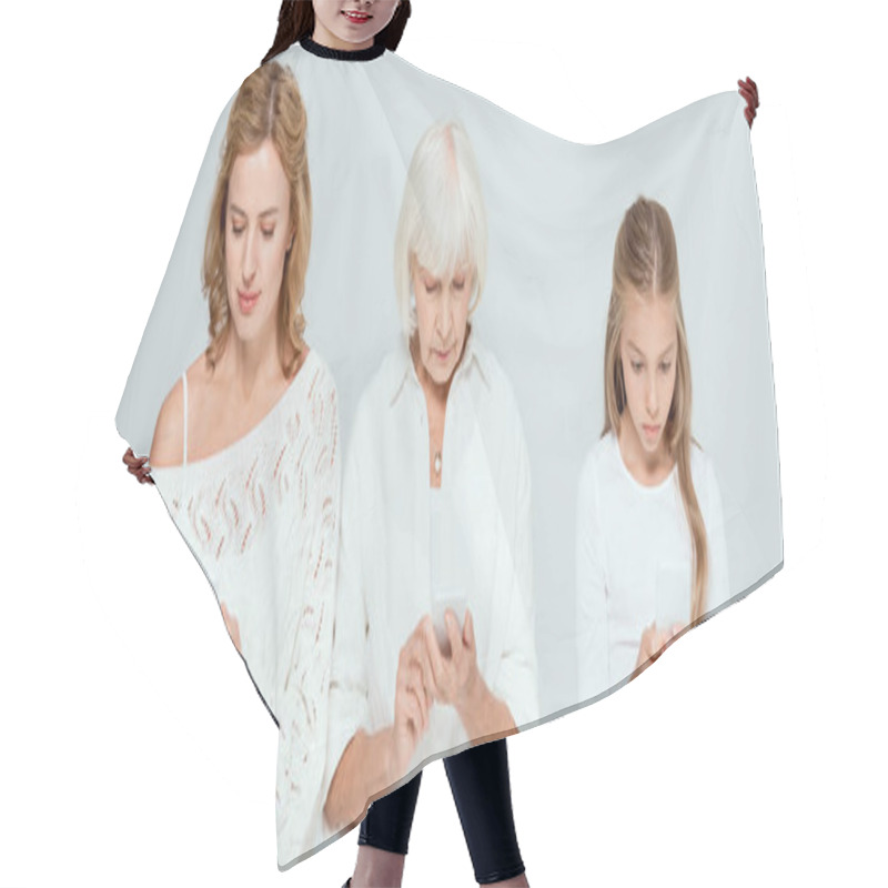 Personality  Panoramic Shot Of Granddaughter, Mother And Grandmother Using Smartphones Isolated On Grey  Hair Cutting Cape